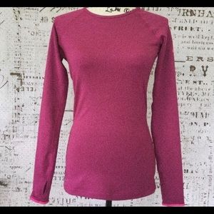 Tight fitted long sleeve shirt.